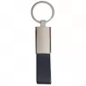 Toma fotográfica de llavero rectangular curpiel promocional, ideal para personalización de marca.