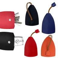 Colección de fundas de piel guardallaves en diversos colores con cordón ajustable, ideales para llaveros promocionales ejecutivos y del sector automotriz